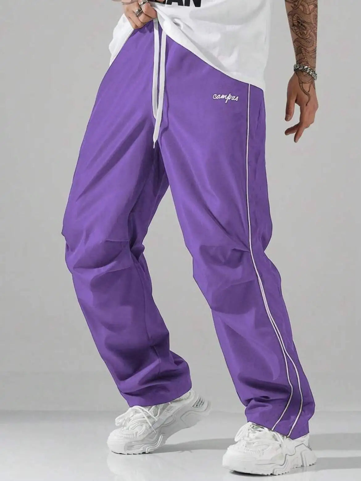 Men's Striped Three - Color Casual Pants with Pockets, Suitable for Sports, Fitness and Jogging  。